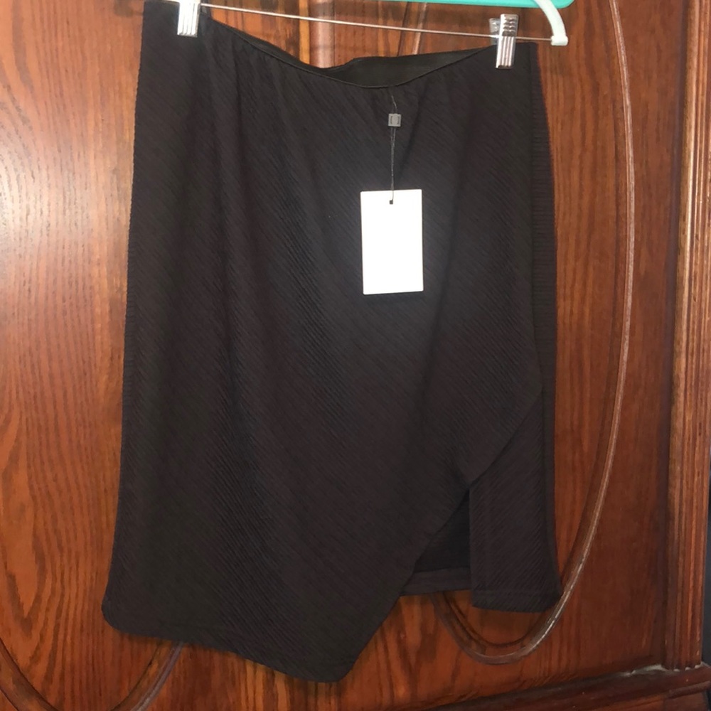 Junarose black short skirt. NWT. Faux wrap front